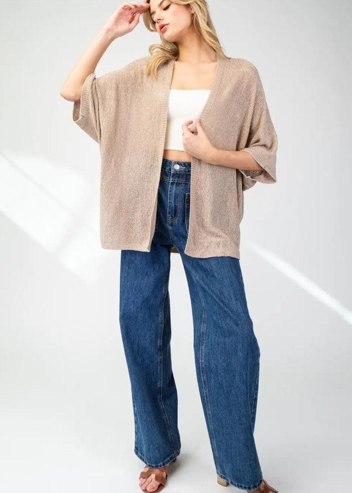 dolman sleeved tan colored open cardigan