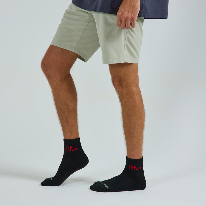 Del Campo Ohio State Night Mode golf socks on a male model in studio