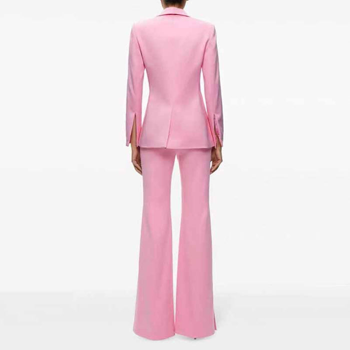 Elegant pink women's pantsuit for wedding featuring a tailored blazer and flared trousers.