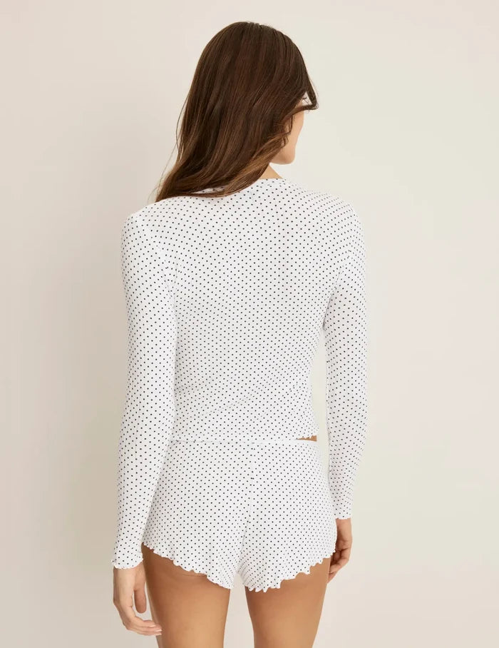 | Back view of model wearing the Pointelle Cardigan highlighting the coverage and fit | White with Black Polka Dot