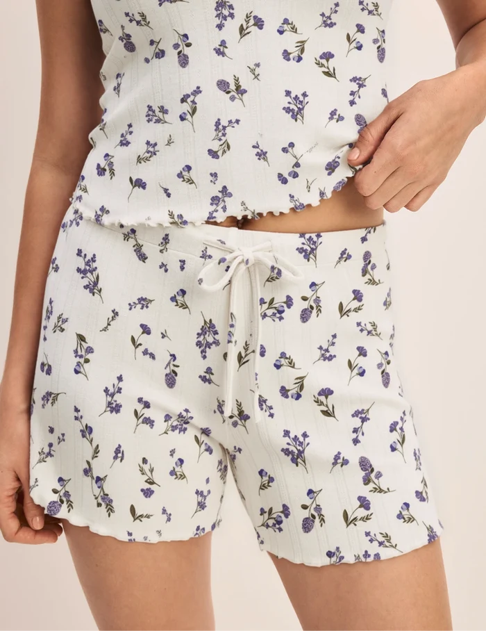 | Front view of model wearing the Pointelle Short highlighting the coverage and fit | Meadows
