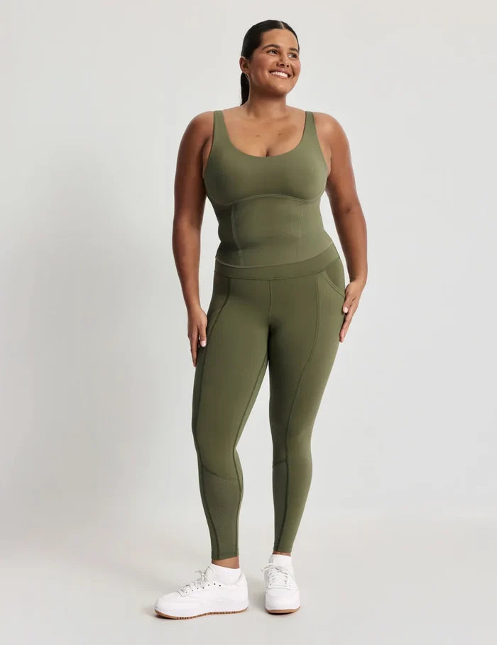 Adiya has 40” hips and wears a size L | Front view of model highlighting the coverage and fit   | Olive