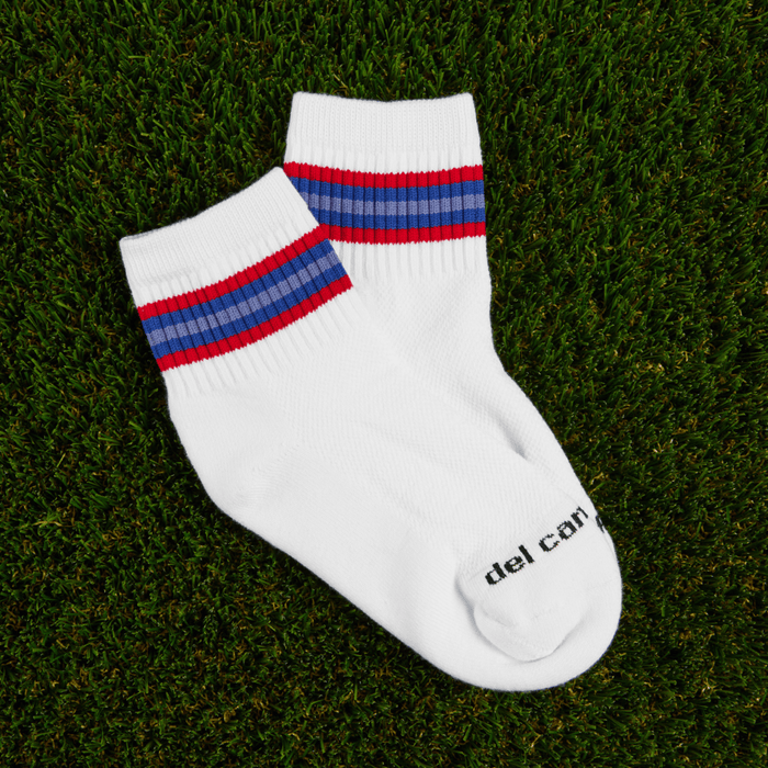 Del Campo Freedom Stripe Pack golf socks featuring four patriotic stripe designs in red, white, and blue