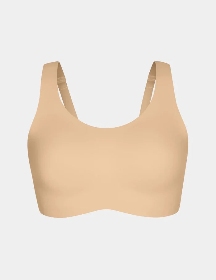| View of Revolution Adjustable Pullover Bra shown front-facing against a light gray background | Warm Sand