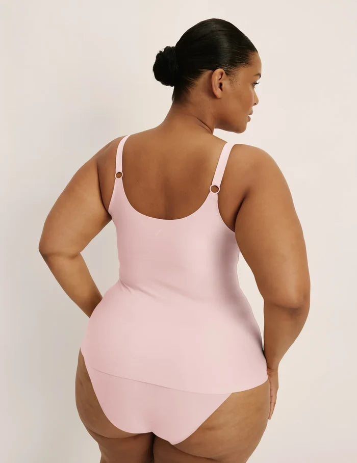Leslie is a 38D and wearing KNIX XL+ | Back view of model wearing the Revolution Nursing Tank, highlighting the neckline, strap design, and smooth silhouette | Rose Water