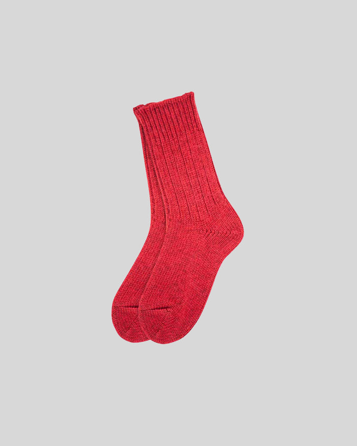 Red ribbed crew socks with textured knit fabric against neutral background.