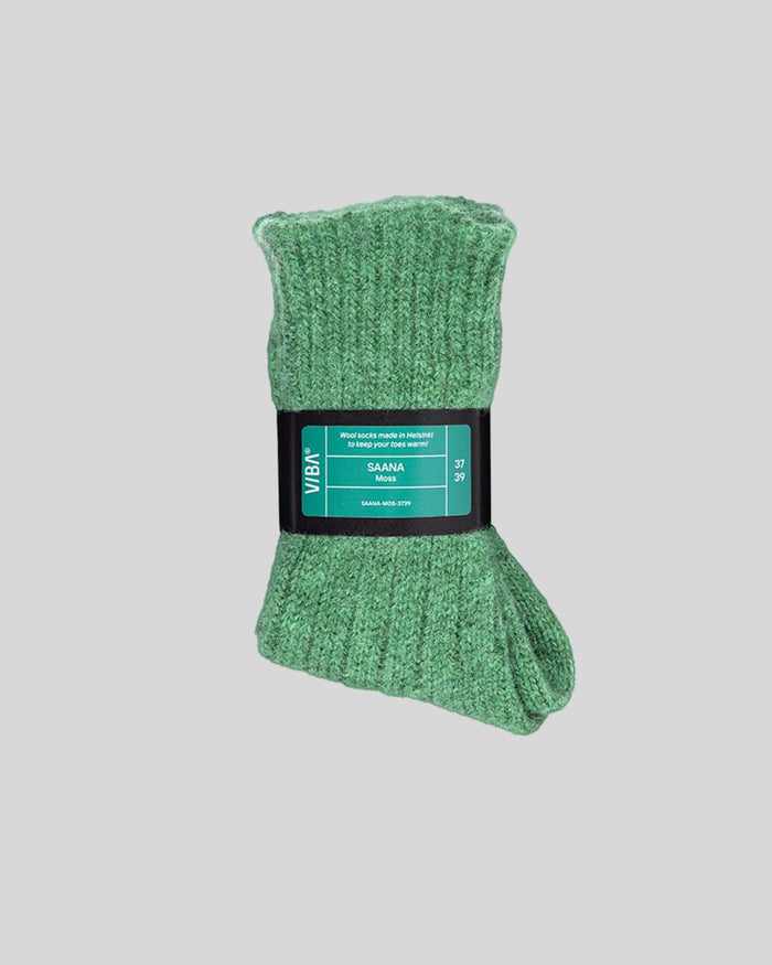 Moss-green knit socks with ribbed texture and black product label band around the middle.