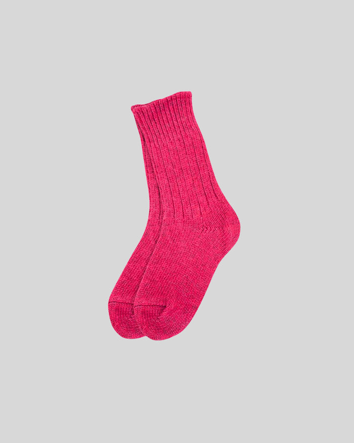 Bright pink ribbed crew sock with textured knit fabric and reinforced heel and toe areas.