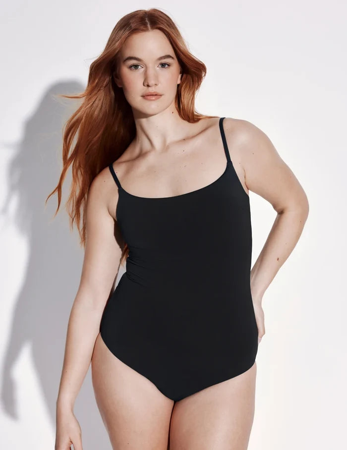 | Front view of model wearing the Sculpt Classic One Piece Swimsuit highlighting the neckline, coverage and fit | Black