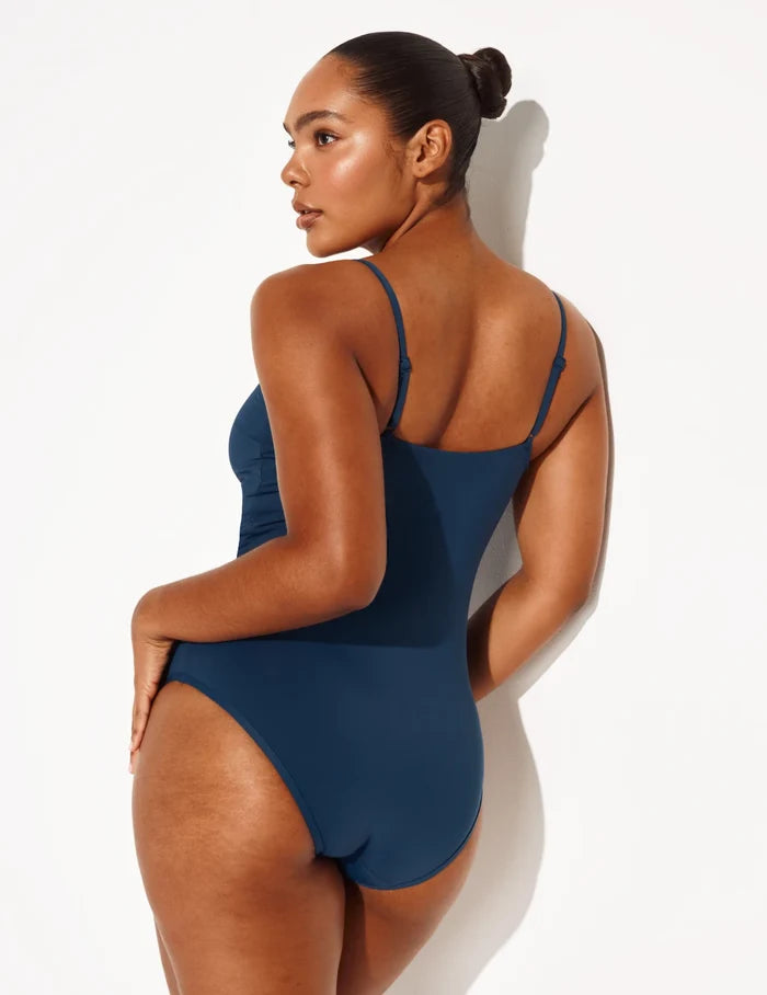 | Back view of model wearing the Sculpt Classic One Piece Swimsuit highlighting the neckline, coverage and fit | Horizon