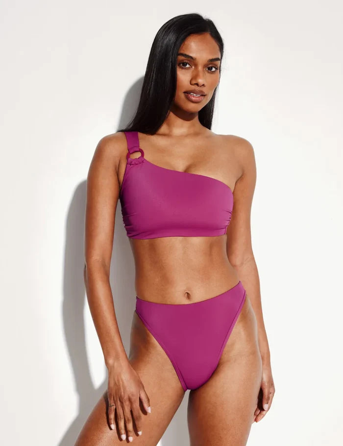 | Front view of model wearing the Sculpt One Shoulder Bikini Top, highlighting the neckline, strap design, and smooth silhouette | Deep Orchid