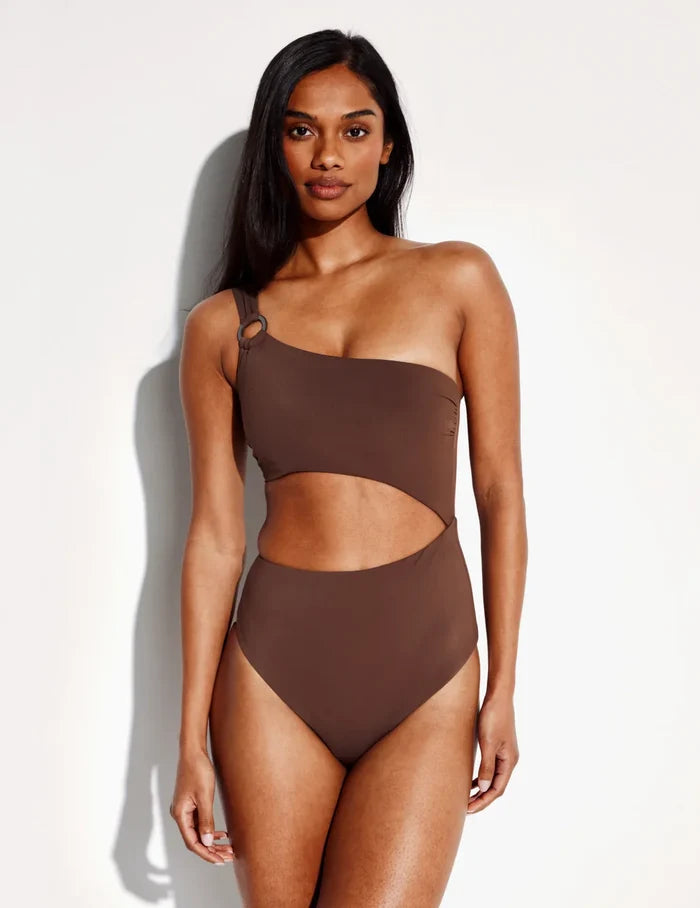 | Front view of model wearing the Sculpt One Shoulder One Piece Swimsuit highlighting the neckline, coverage and fit | Espresso