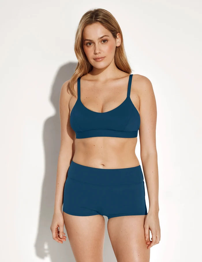 | Full-body view of model wearing the Sculpt Scoop Bikini Top, highlighting the neckline, strap design, and silhouette | Horizon