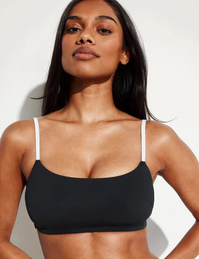 Jay is a 30E wearing KNIX S+ | Front view of model wearing the Sculpt Square Neck Bikini Top, highlighting the neckline, strap design, and silhouette | Black/White