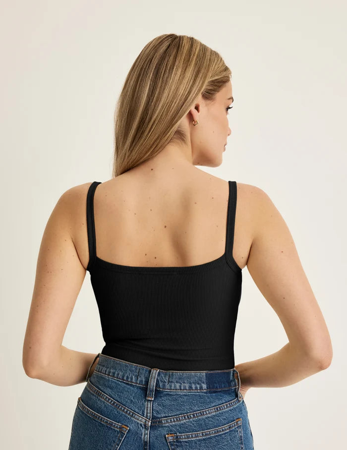 Sarah is a 34DD wearing KNIX M | Back view of model wearing the SculptRib™ Cotton Cami highlighting the neckline, fabric and hugging fit | Black