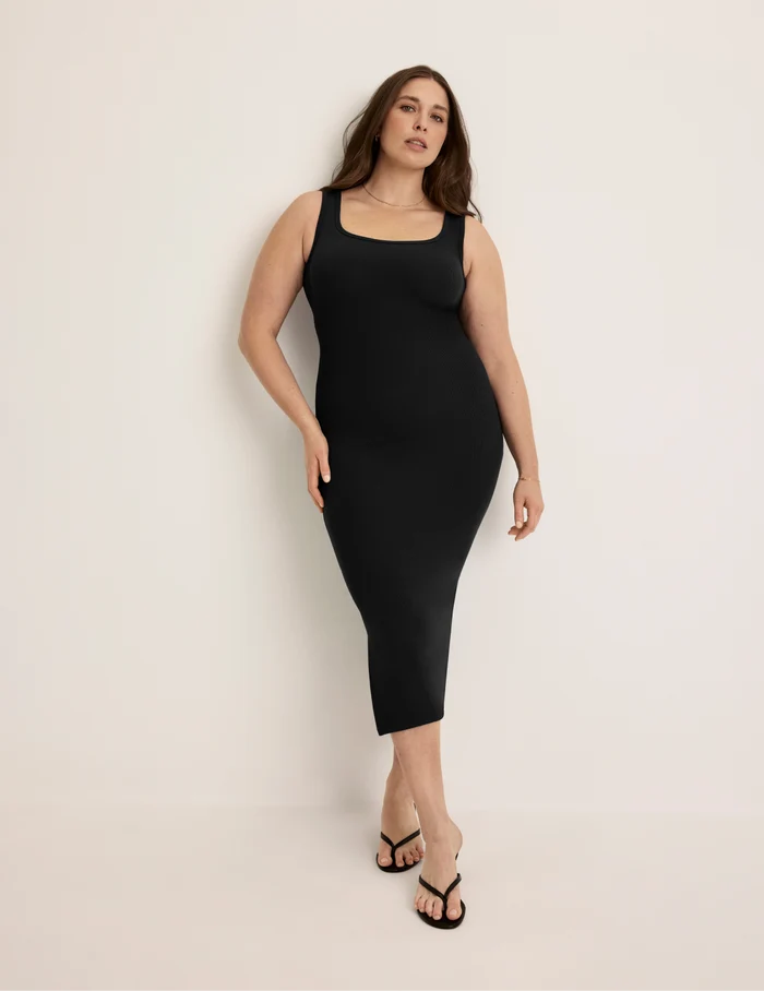 Beatrice is 5’7.5” tall and wearing KNIX XL | Front view of model wearing the SculptRib™ Cotton Tank Dress highlighting the neckline, hemline and hugging fit | Black