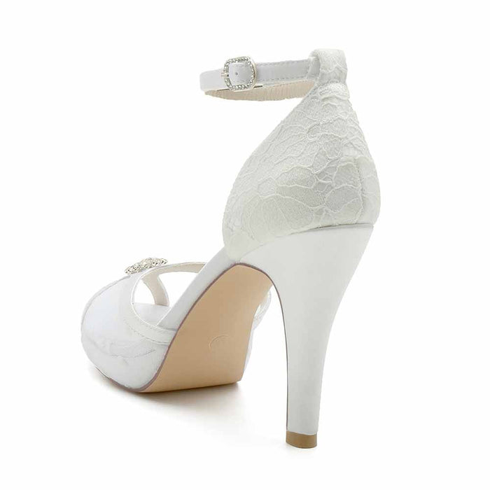 Elegant wedding pumps with lace featuring an adjustable ankle strap and a stylish heel