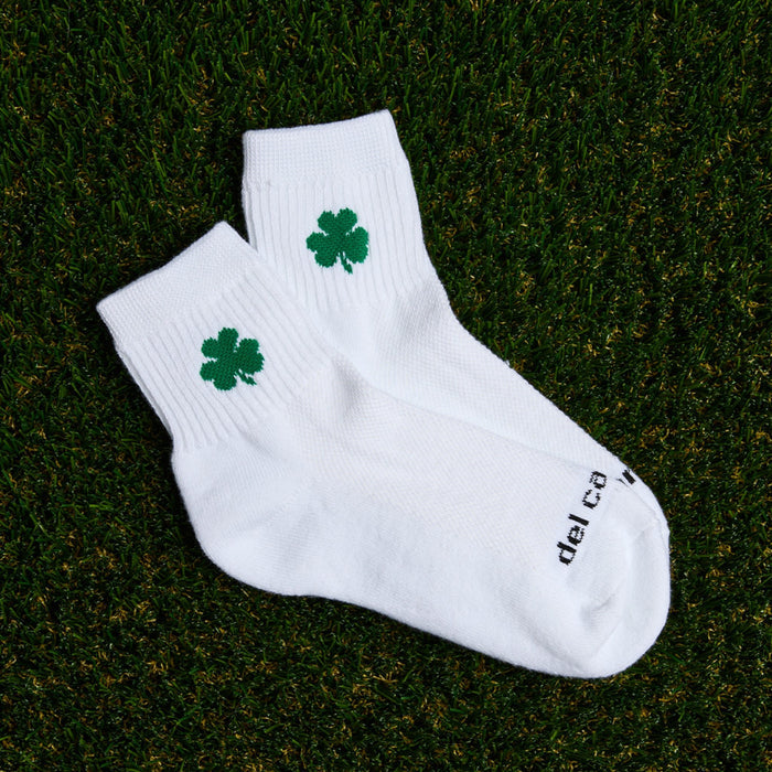 Del Campo St. Paddy's Pack golf socks, on golf-course turf