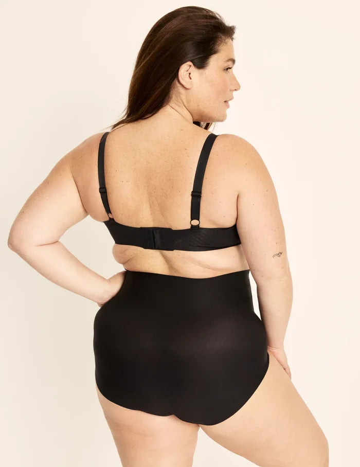 Clementine has 51" hips, is 5'9.5" tall and wears a size XXL | Back view of model wearing the Shaper High Rise Leakproof Briefs, highlighting the coverage and smooth fit | Black