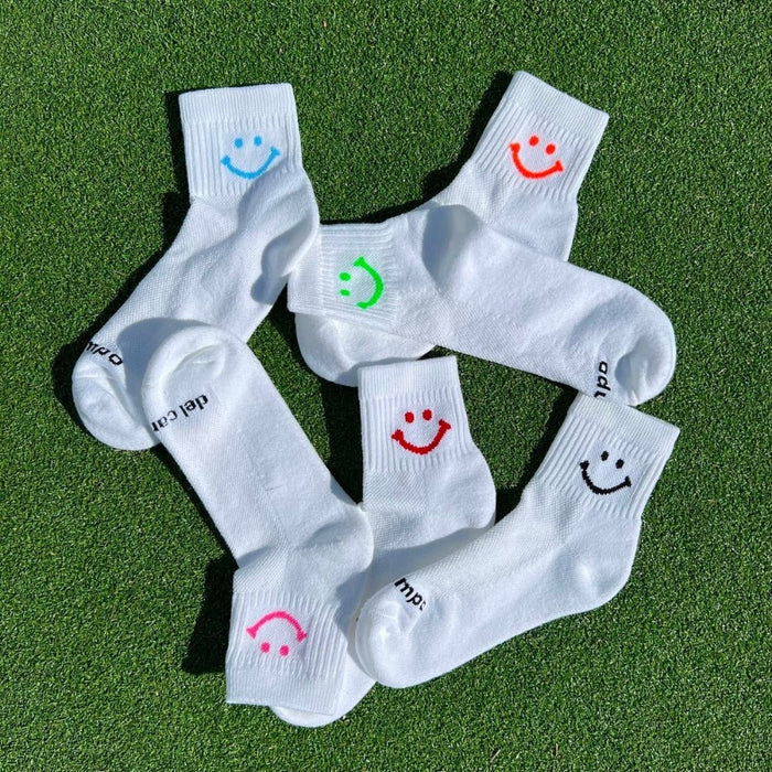 Del Campo Smiley Pack golf socks featuring all six smiley designs: classic, blue, green, pink, orange, and red