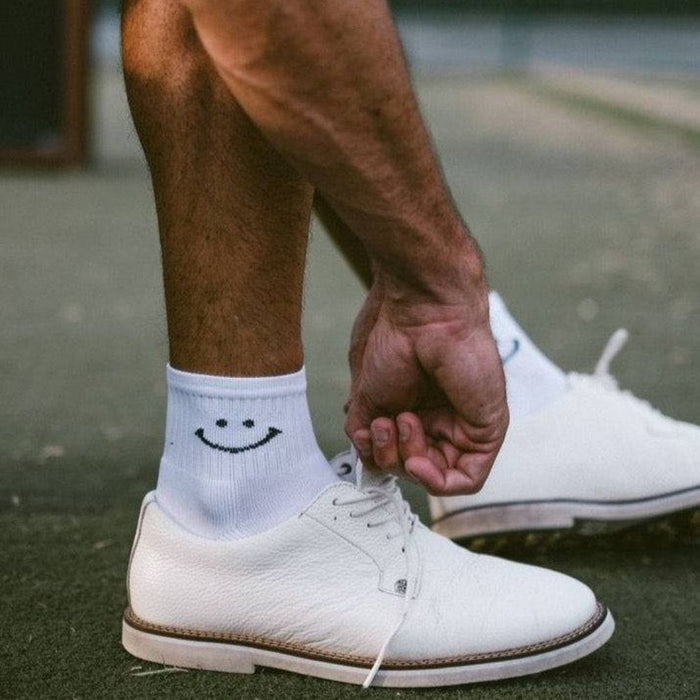 Del Campo Smiley Pack golf socks featuring all six smiley designs: classic, blue, green, pink, orange, and red