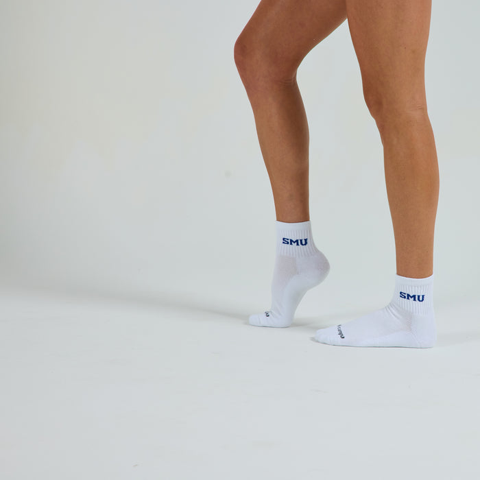 Man wearing Del Campo SMU Mustangs golf socks, studio shot, no shoes