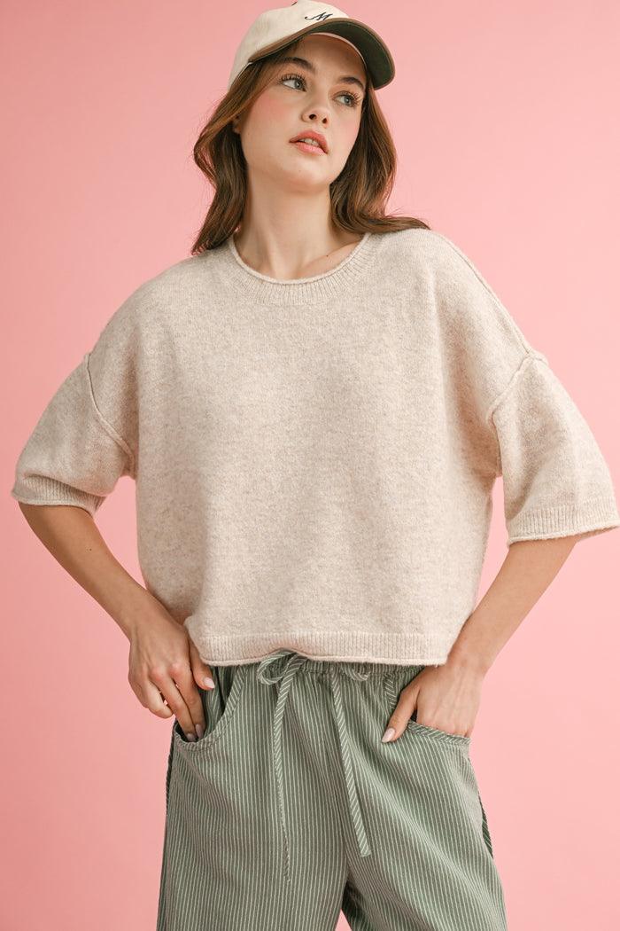 Very soft oatmeal color crop-waisted, oversized shoulder light weight sweater