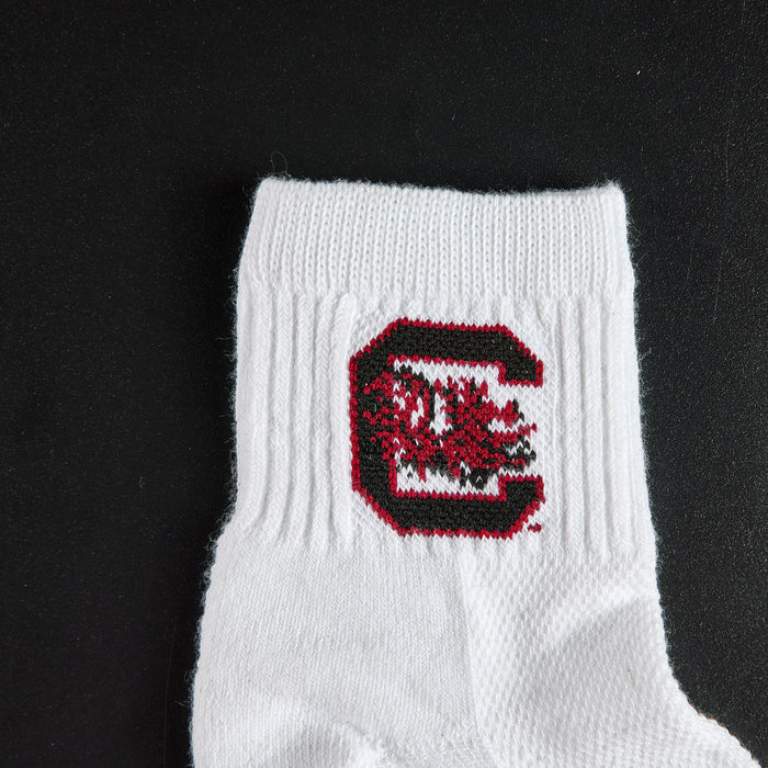 Close-up of the garnet and black block C on Del Campo South Carolina Gamecocks golf socks