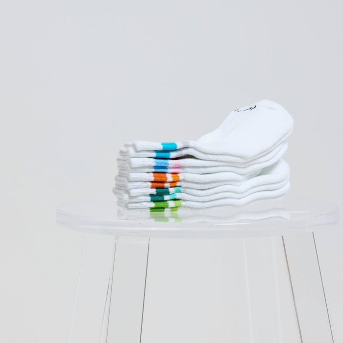 Del Campo Spring Stripe Pack golf socks featuring spring stripe designs: cotton candy, lime green, light orange, and blue/grey