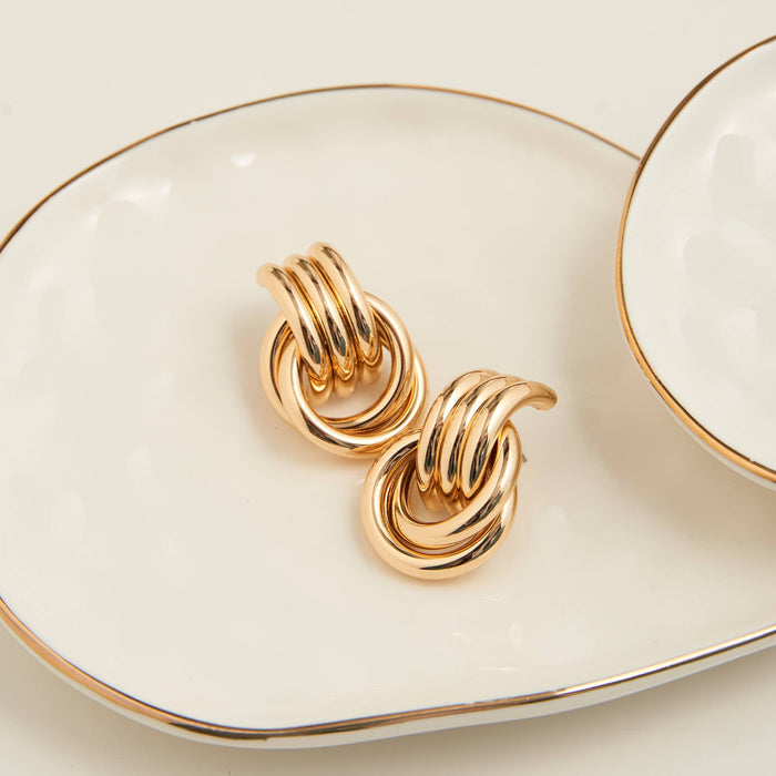 Interlocking triple loop design earrings