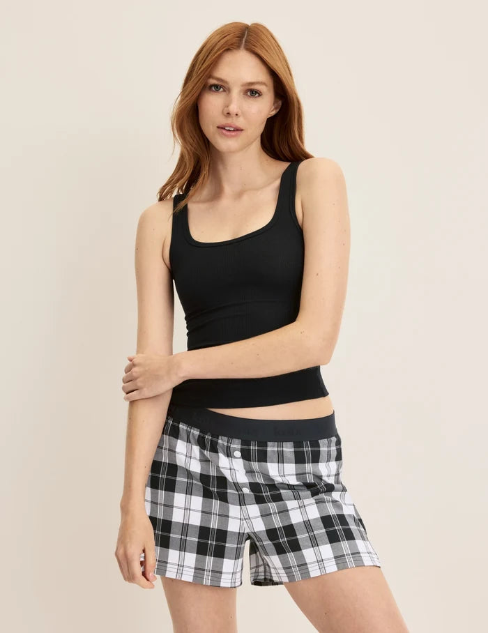 Molly has 35.5” hips and wears KNIX S | Front view of model wearing the Super Leakproof® Dream Boxer™ highlighting the coverage and fit | Plaid