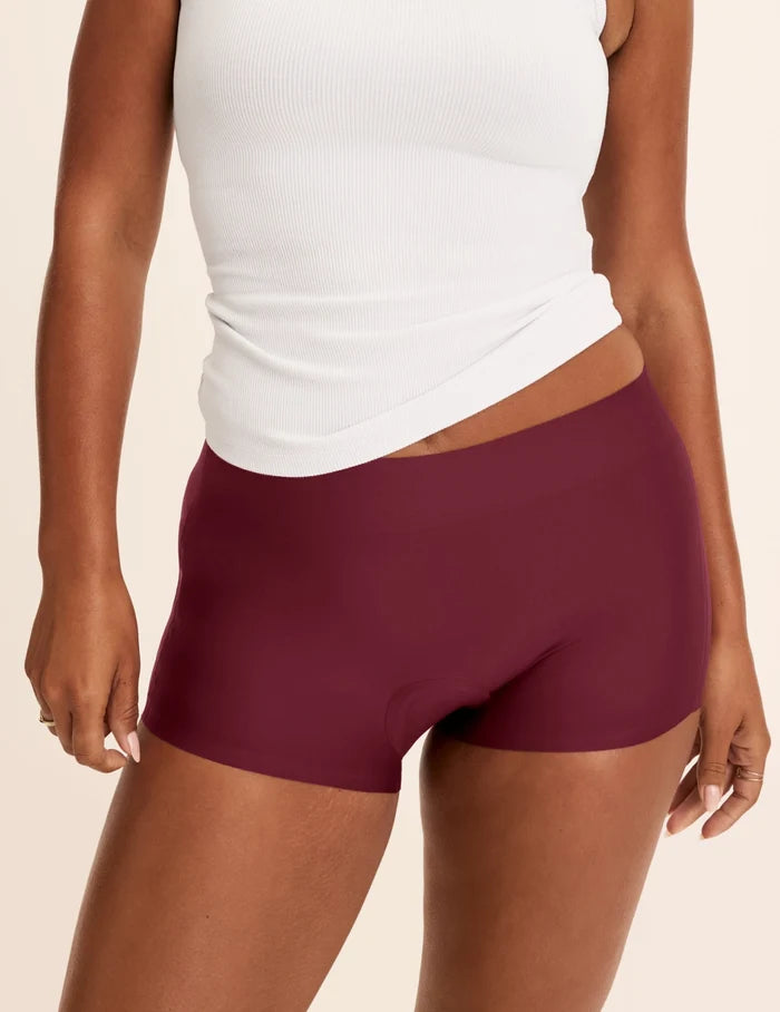 Maya has 40” hips and wears KNIX M | Front view of model wearing the Super Leakproof® Dream Short™ highlighting the coverage and smooth fit | Dark Cherry