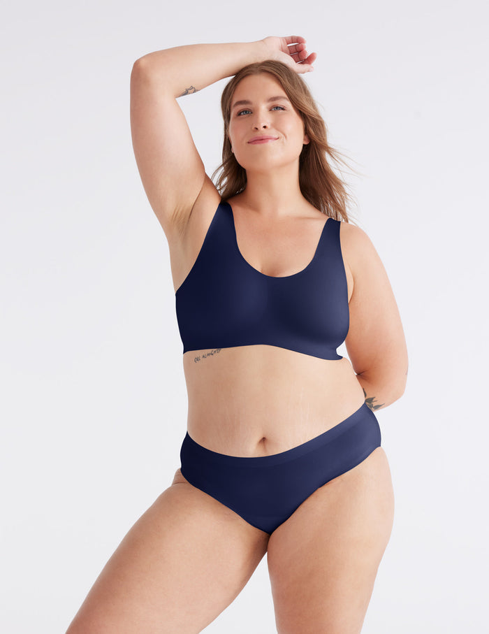 | Front view of model highlighting the coverage and fit | Midnight