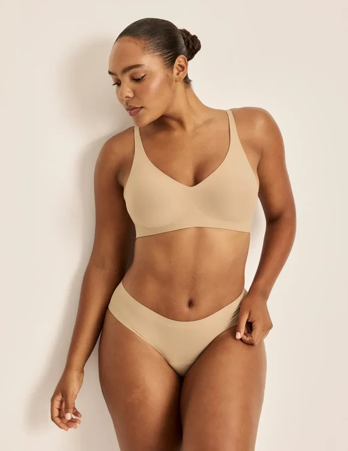 | Front view of model highlighting the coverage and fit | Warm Sand