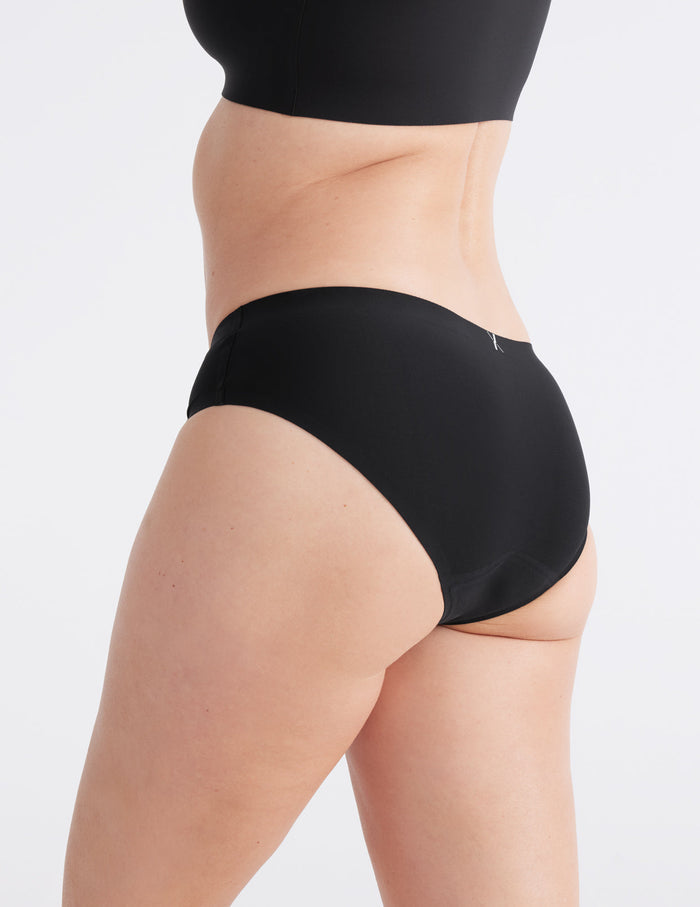 | Front view of model highlighting the coverage and fit | Black