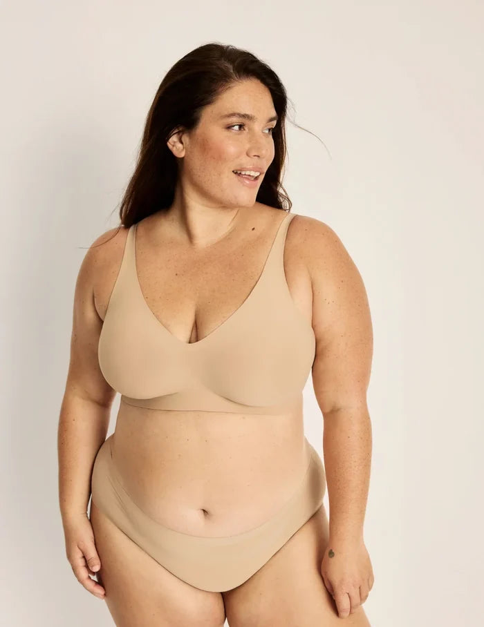 | Front view of model highlighting the coverage and fit | Warm Sand
