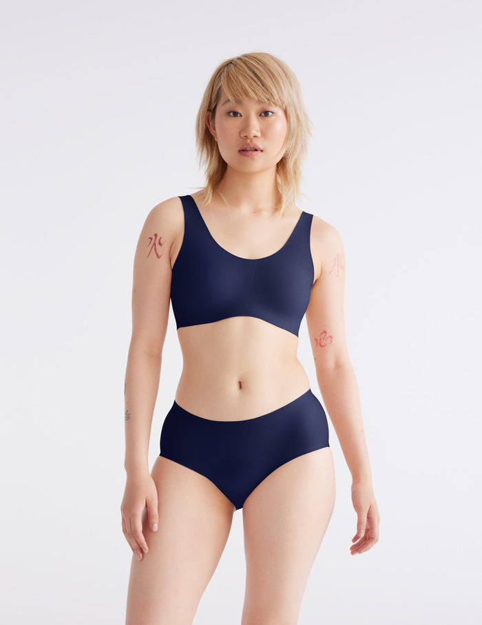 | Front view of model highlighting the coverage and fit | Midnight