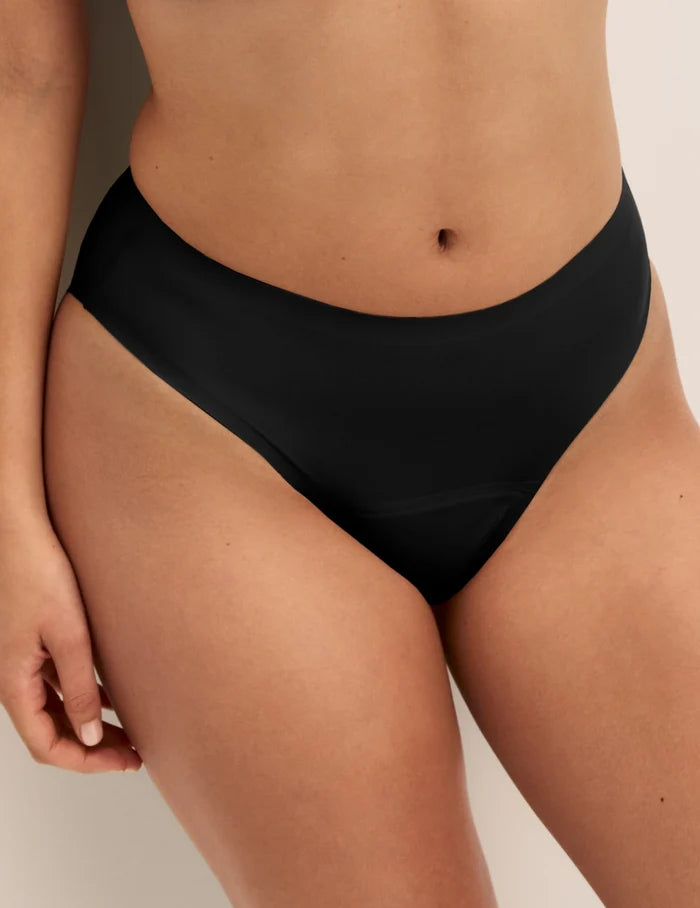 Megan has 36.5” hips and wears KNIX S | Front view of model wearing the Super Leakproof® No-Show French Cut highlighting the coverage and smooth fit | Black