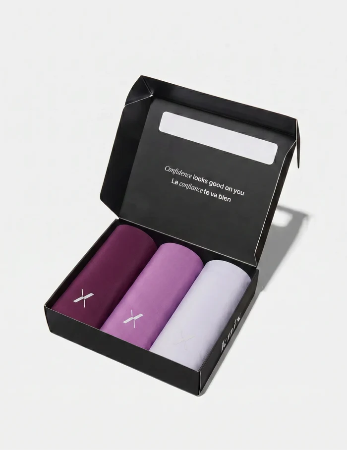 | Super Leakproof® No-Show High Rise 3-Pack in an open box shown front-facing against a light gray background | Berry/Violet/Lavender