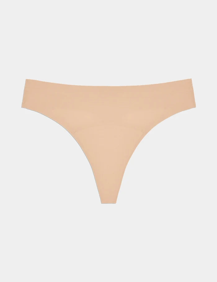 | Super Leakproof® No-Show Thong shown front-facing against a light gray background | Warm Sand