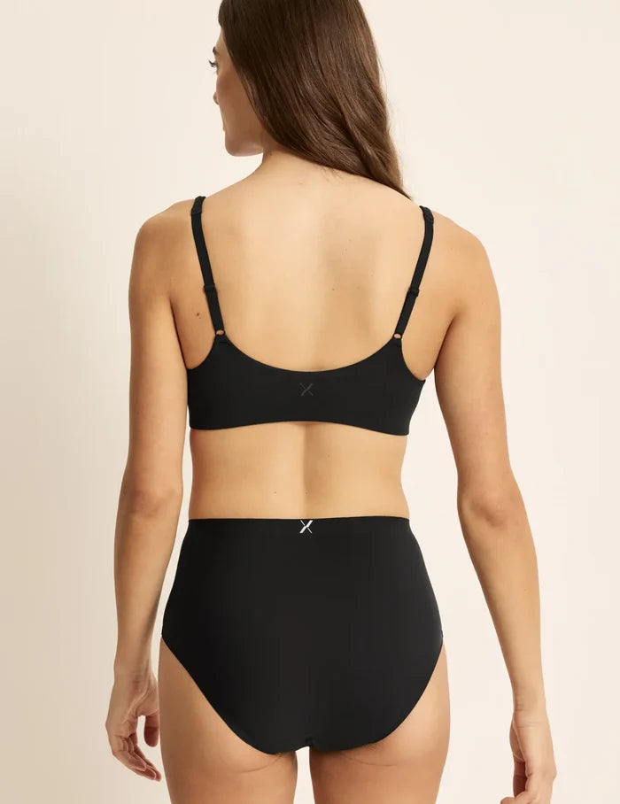 Sofia is 32D and wears a Knix size S+ | Back view of model wearing the SweetDreams Nursing Bra, highlighting the neckline, strap design, and silhouette | Black