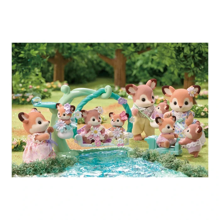 Sylvanian Families Deer Family playing by the water in a forest scene