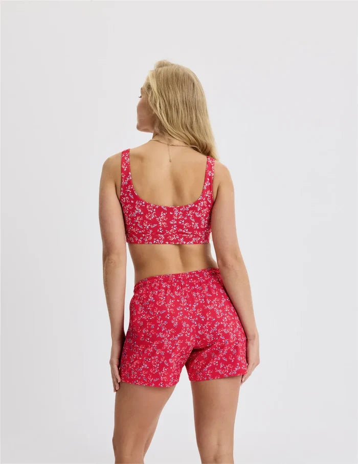 | Back view of model wearing the Teen Double Scoop Bikini Top highlighting the neckline, strap design, and silhouette | Poppy Petal