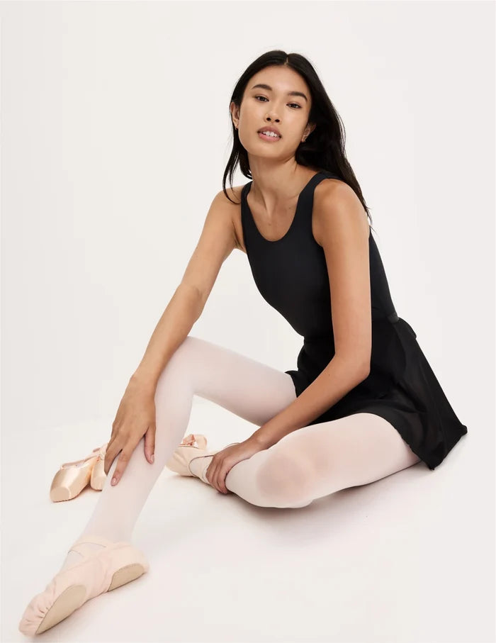 | Front view of model wearing the Teen Leakproof Leotard highlighting the coverage and fit | Black