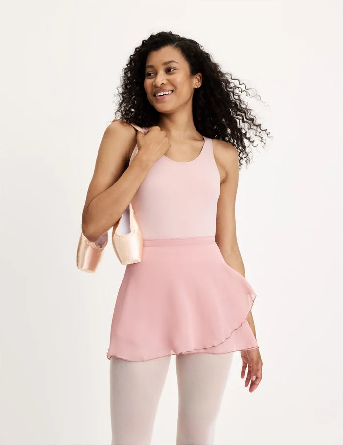 | Front view of model wearing the Teen Leakproof Leotard highlighting the coverage and fit | Blush