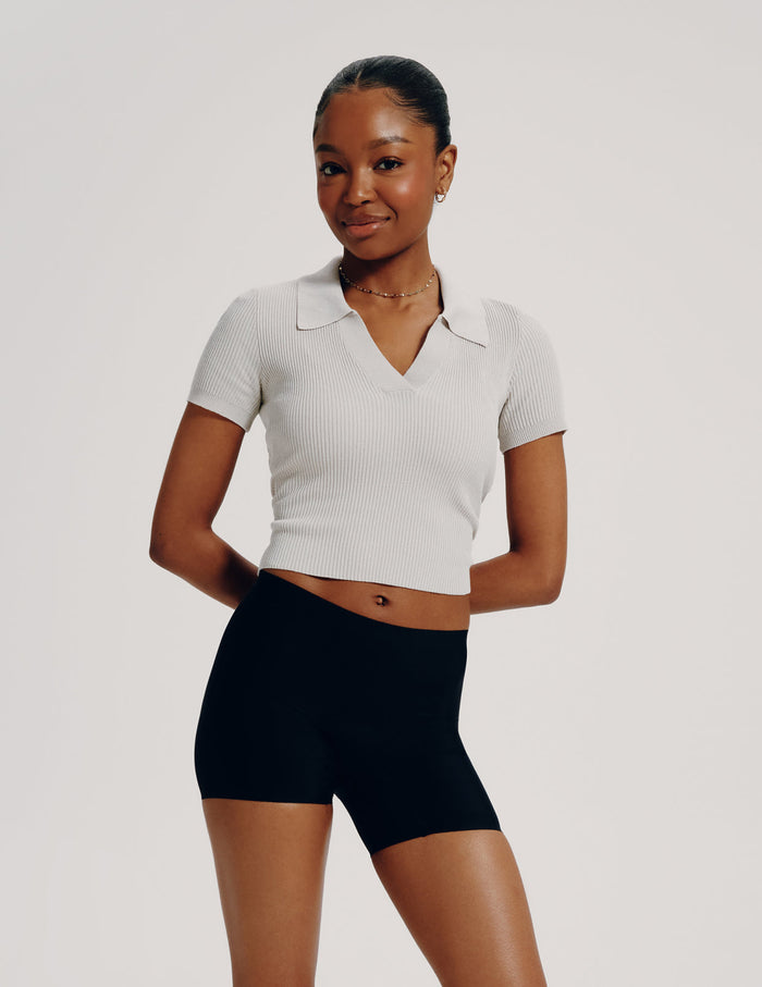 | Full-body view of model wearing the Teen Leakproof Shortie highlighting the coverage and smooth fit | Black