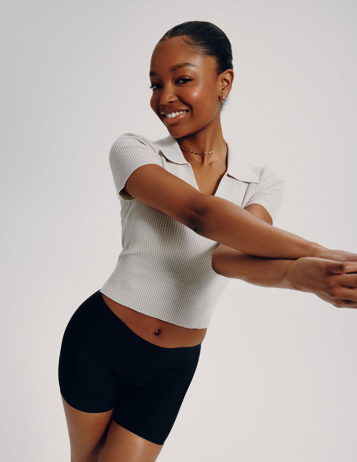 | Front view of model wearing the Teen Leakproof Shortie highlighting the coverage and smooth fit | Black
