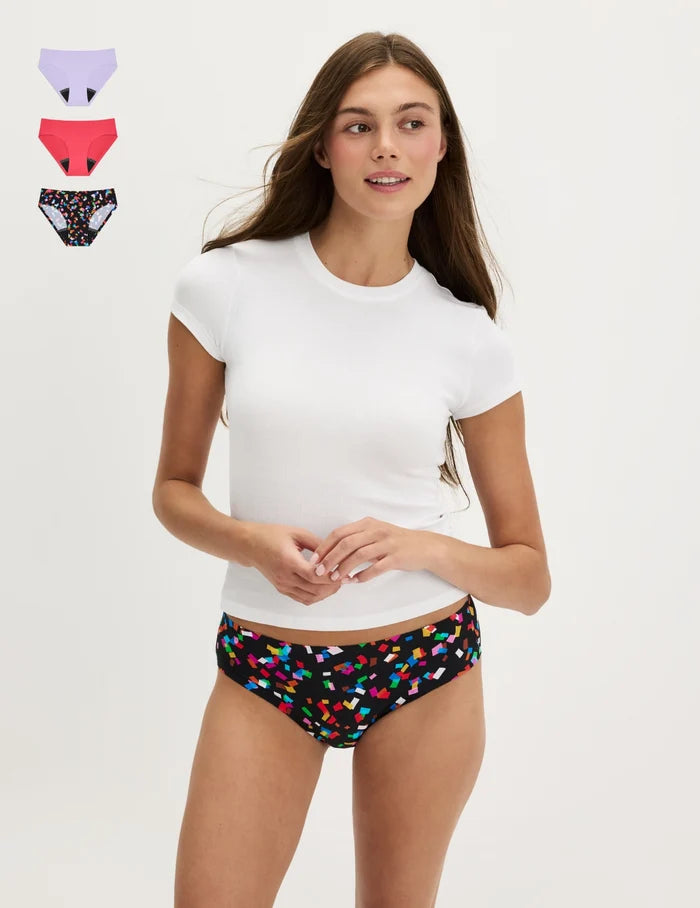 | Front view of model wearing the Teen Leakproof UltraThin Bikini highlighting the coverage and smooth fit | Confetti/Ultra Violet/Raspberry