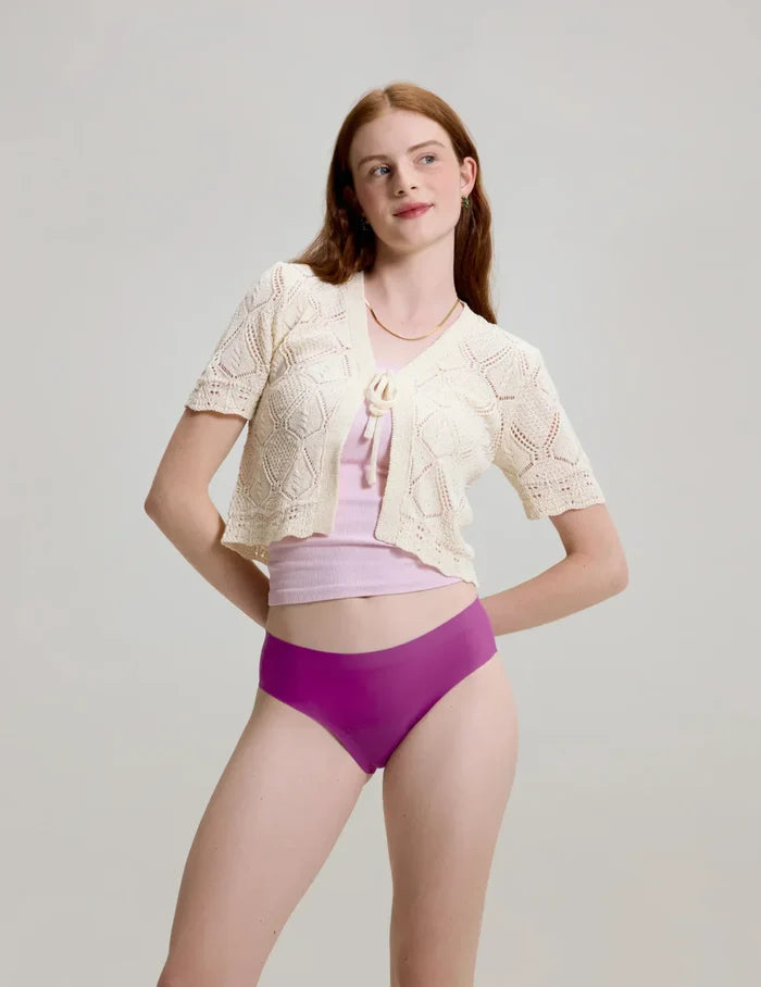 | Front view of model wearing the Teen Leakproof UltraThin Bikini highlighting the coverage and smooth fit | Comet/Atmosphere/Starstruck
