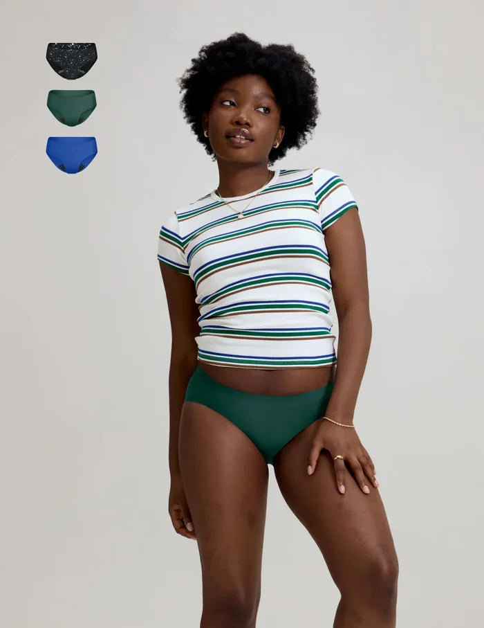 | Front view of model wearing the Teen Leakproof UltraThin No-Show Bikini highlighting the coverage and smooth fit | Blueberry/Holly/Galaxy
